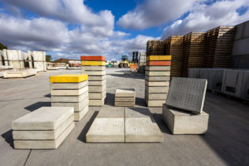 Image of paving slabs stacked up outside 